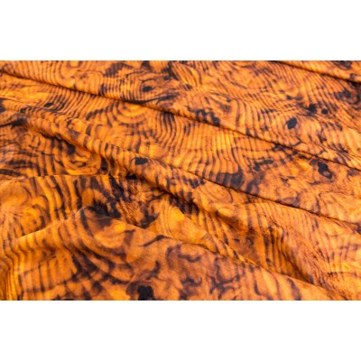 Dekoracyjna tkanina welurowa. Wzór usłojenie drewna. Pomarańcz.